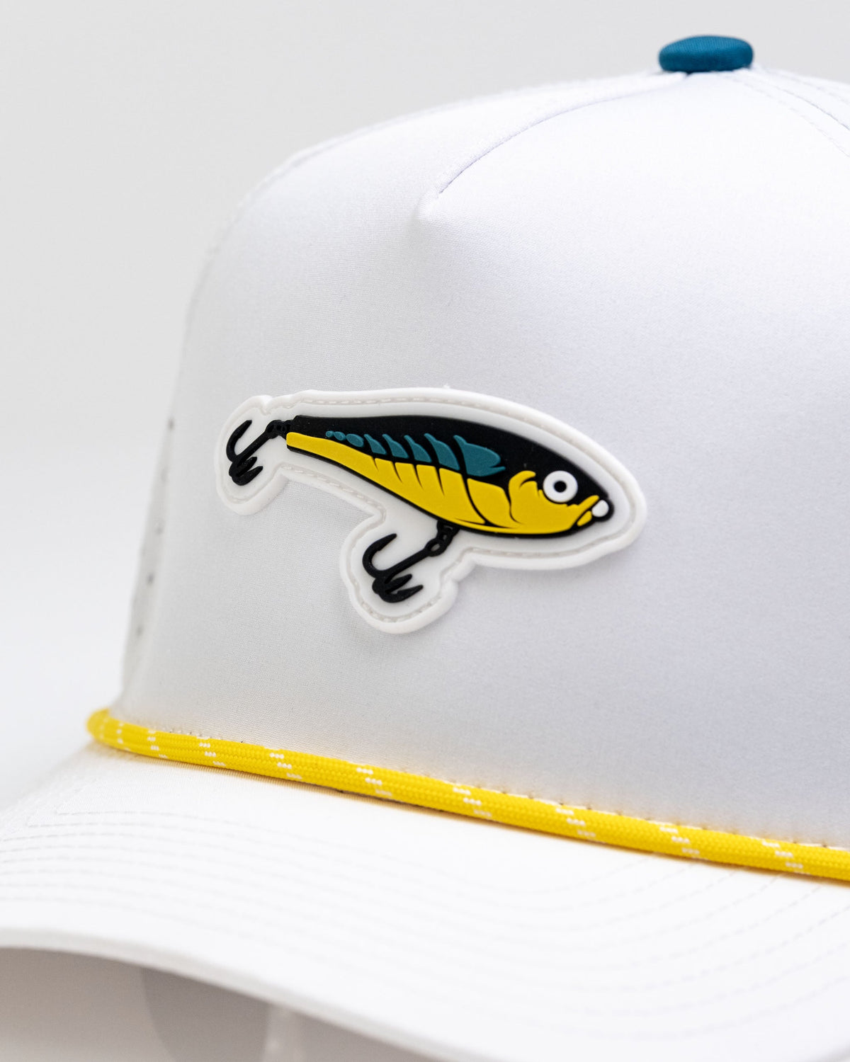 Pins & Aces Fishing Lure Perforated Rope Golf Hat – White
